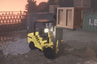 The Forklift lifting a wooden box