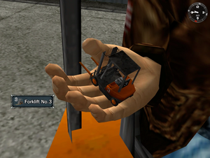 Ryo holding a Forklift Toy Capsule in his hand