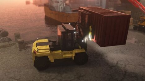 The Industrial Forklift lifting a shipping container