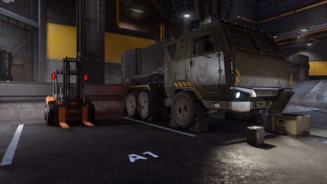 An SL-5 cargo transporter alongside an AMG Transport Dynamics H9 mid-capacity hauler.
