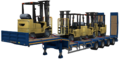 Three Caterpillar Towmotor forklifts on a lowbed trailer