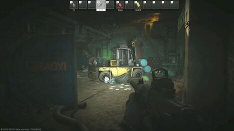 All 12 forklifts are parked inside of the facility